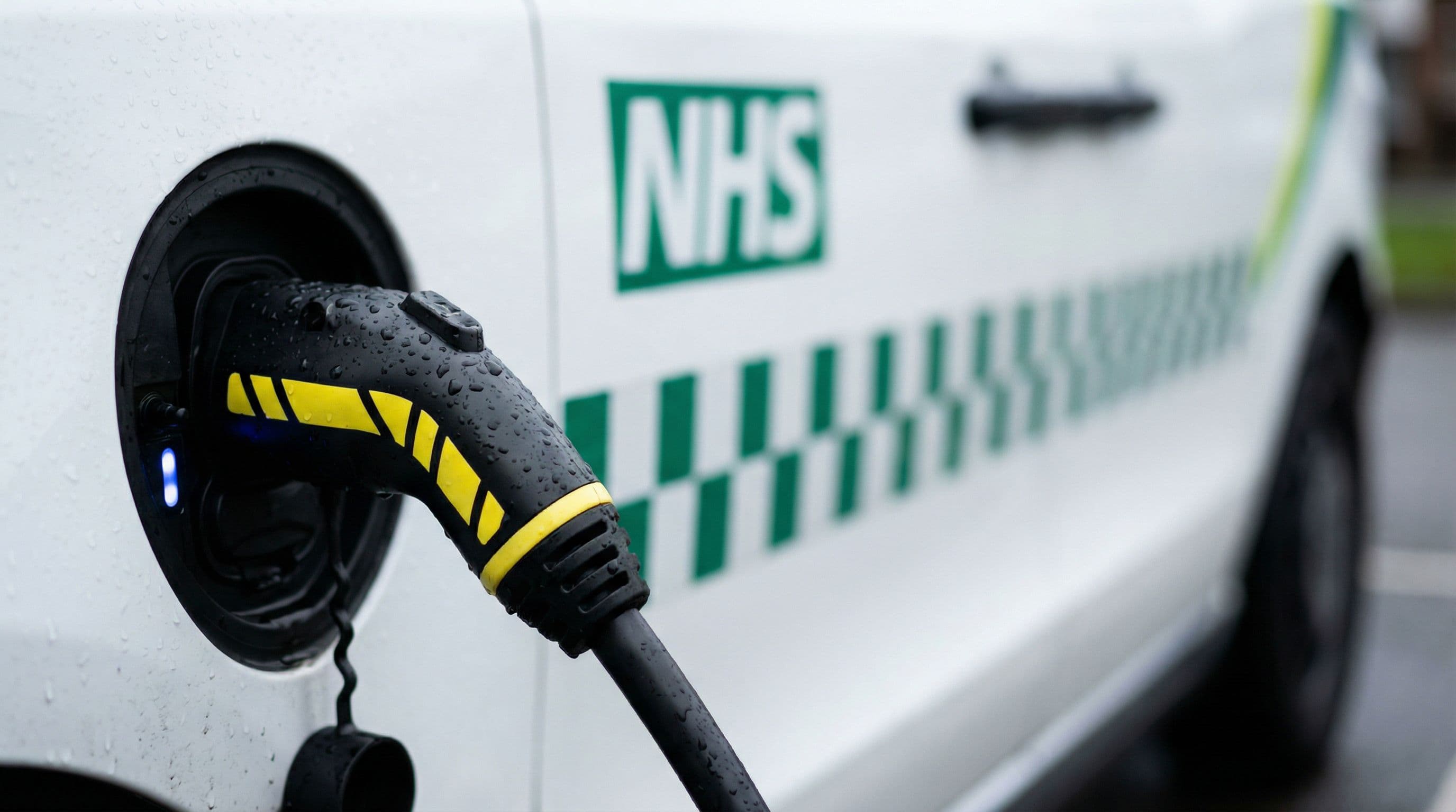 Electric ambulance charges at NHS facility following new infrastructure funding